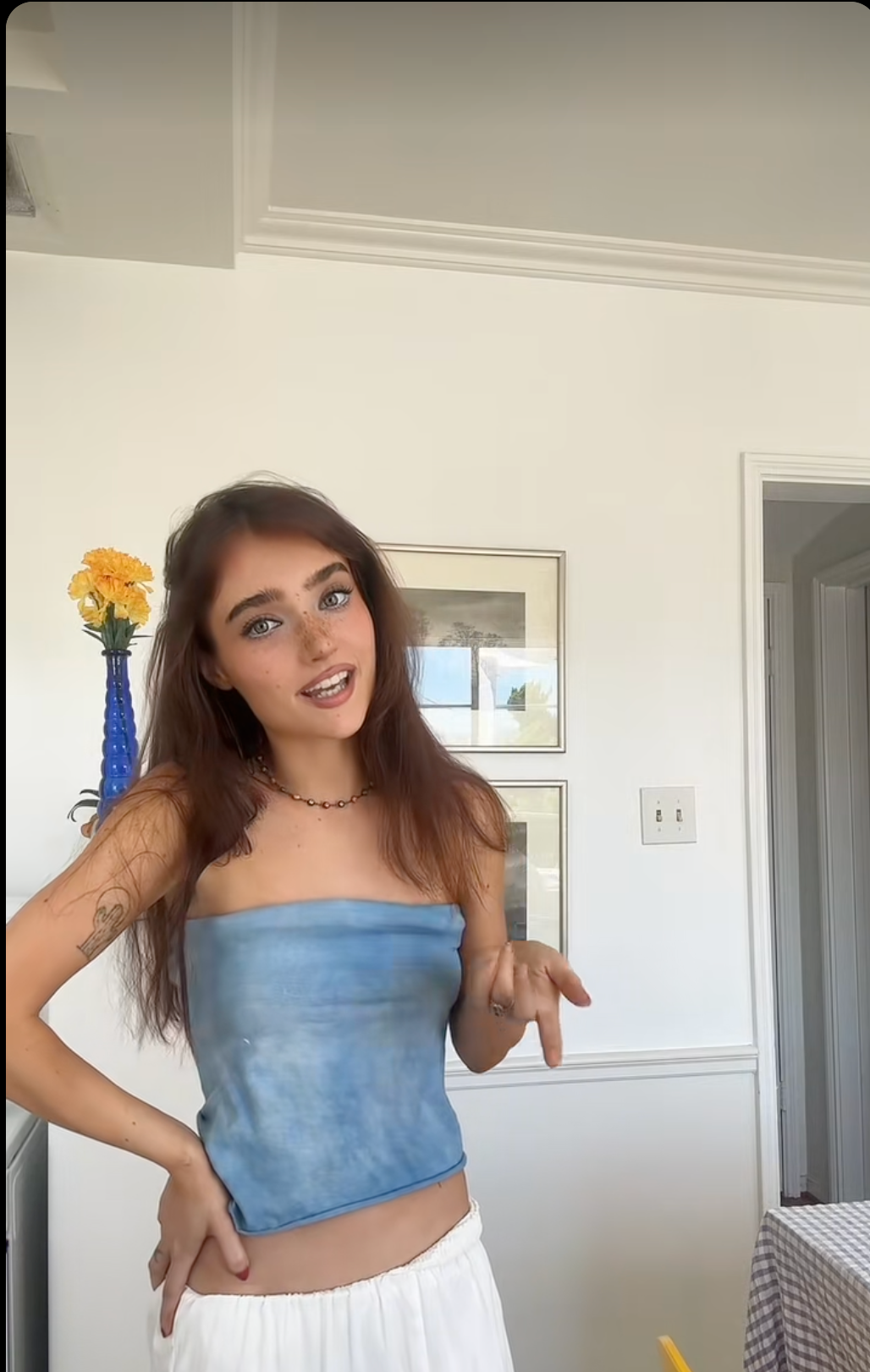 Olivia Cotter aka Olivia Toth in a blue tube top